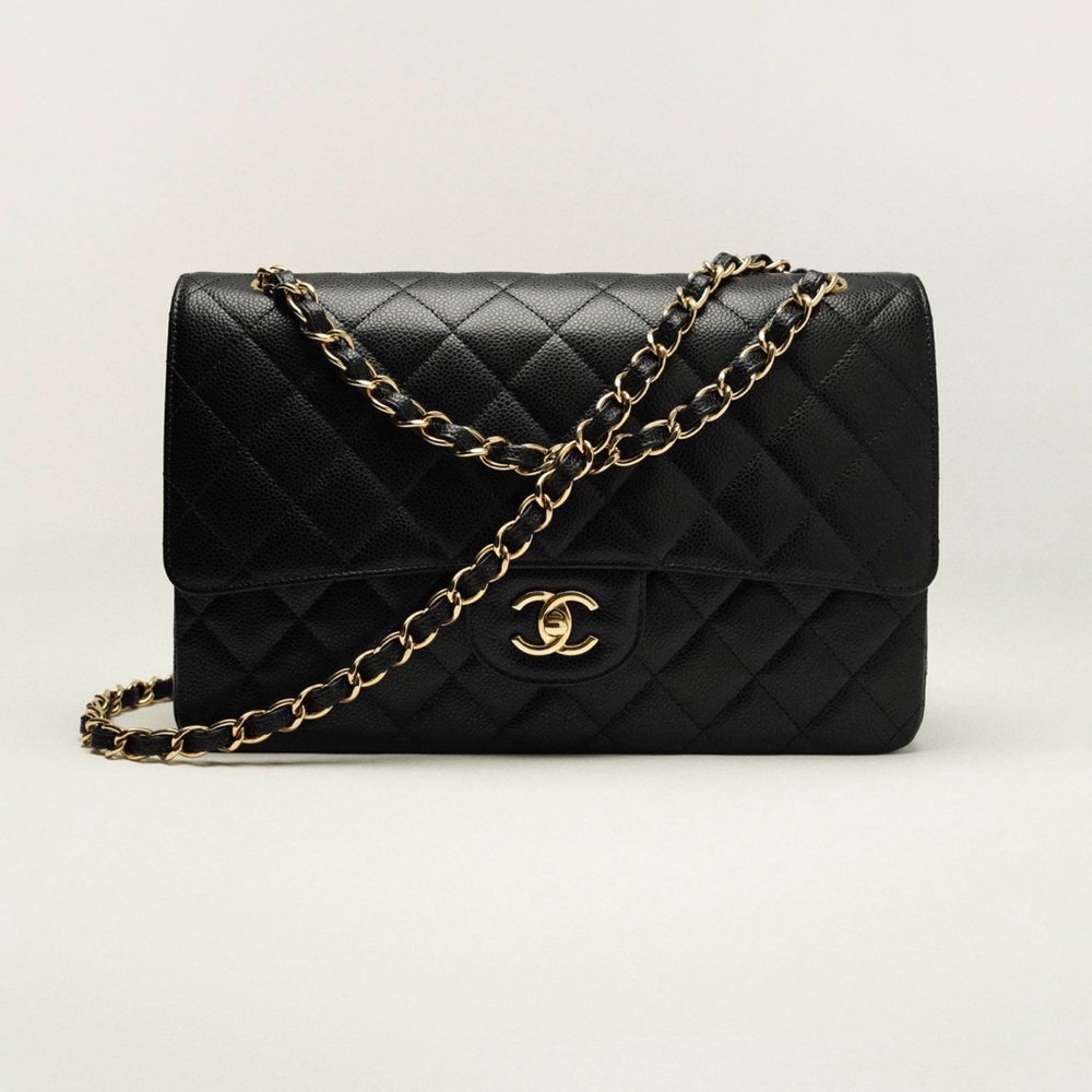 CHANEL Black Classic LargeFlap Bag. Grained Calfskin & Gold-Tone Metal.